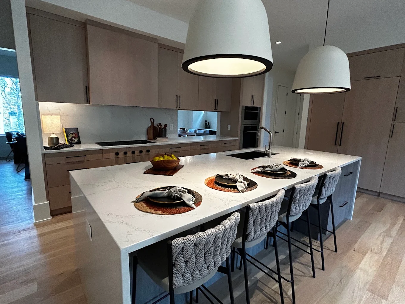 Spotless modern Atlanta kitchen with a large island cleaned by White Rabbit Cleaning